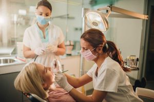 Women with braces getting an Orthodontic Appointment.