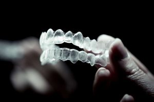Keep teeth straight after braces with retainers.